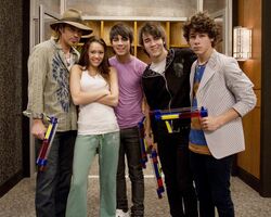 Miley and Billy Ray Cyrus and the Jonas Brothers