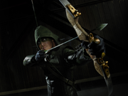 180px-The_Hood_aiming_his_bow_promo.png