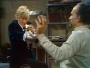 Doctor eats Sandwich while Swordfighting